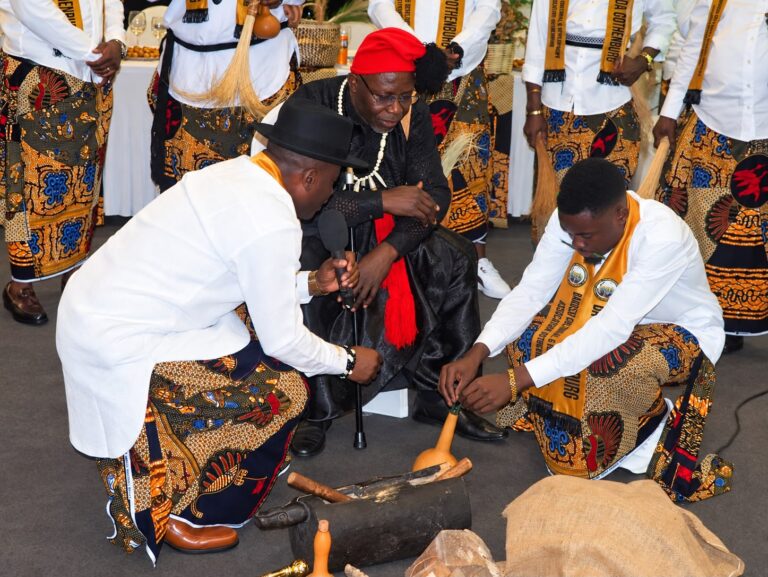 Community members taking part in a cultural ceremony