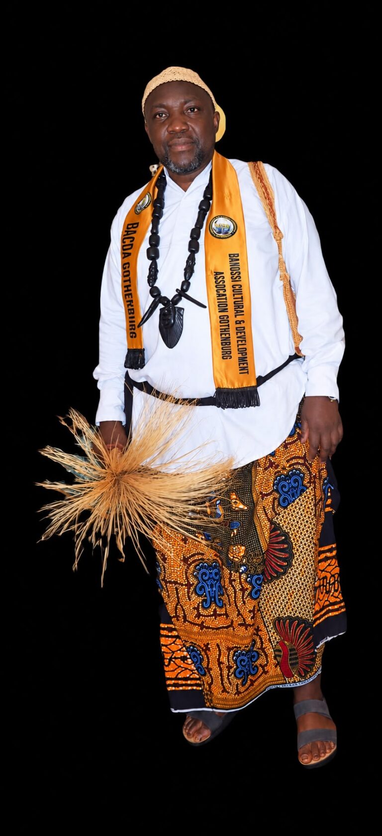 A guest wearing traditional attire at the BACDA celebration