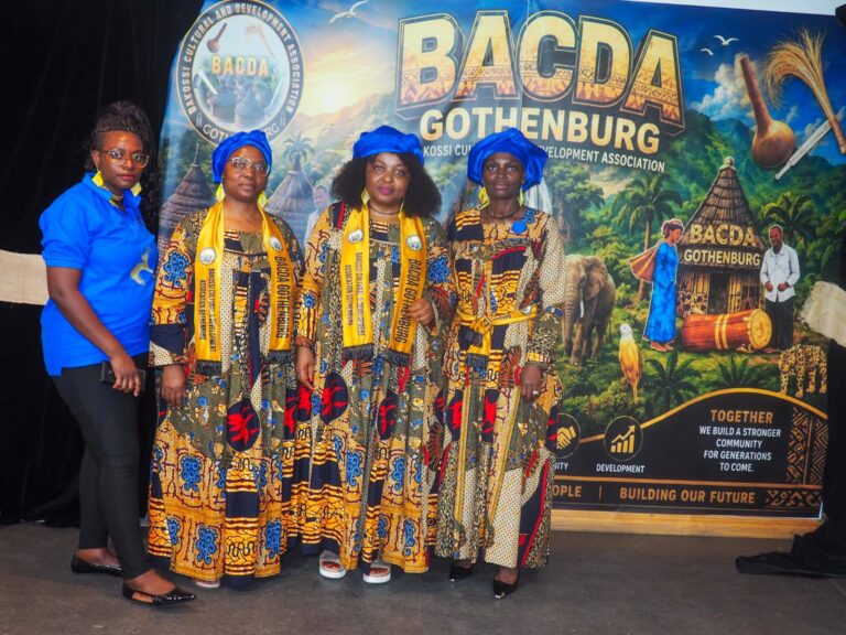 Guests posing in traditional attire at the launch